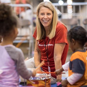 Carolyn Miles, president & CEO of Save the Children meets with children in a mega-shelter in Houston Carolyn Miles, president & CEO of Save the Children meets with children in a mega-shelter in Houston