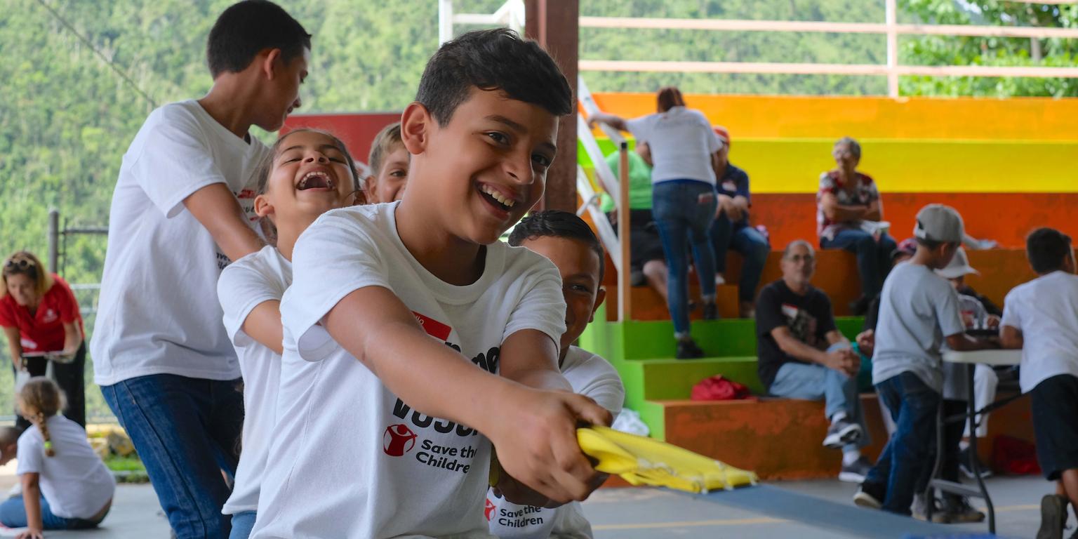 Kids playing tug of war in Puerto Rico, one year after Hurricane Maria Kids playing tug of war in Puerto Rico, one year after Hurricane Maria